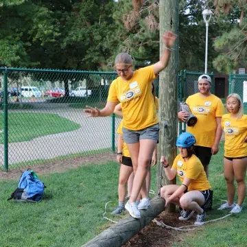 Students do low level ropes course for team building